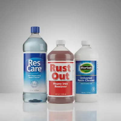 Three different bottles of water softener resin cleaners, showing various brands and types, with emphasis on their iron removal or general maintenance properties.